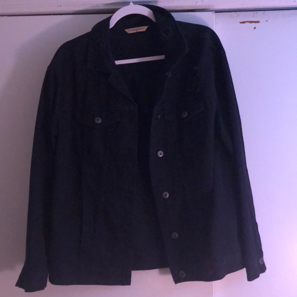 Oversized stressed black jean trucker jacket
